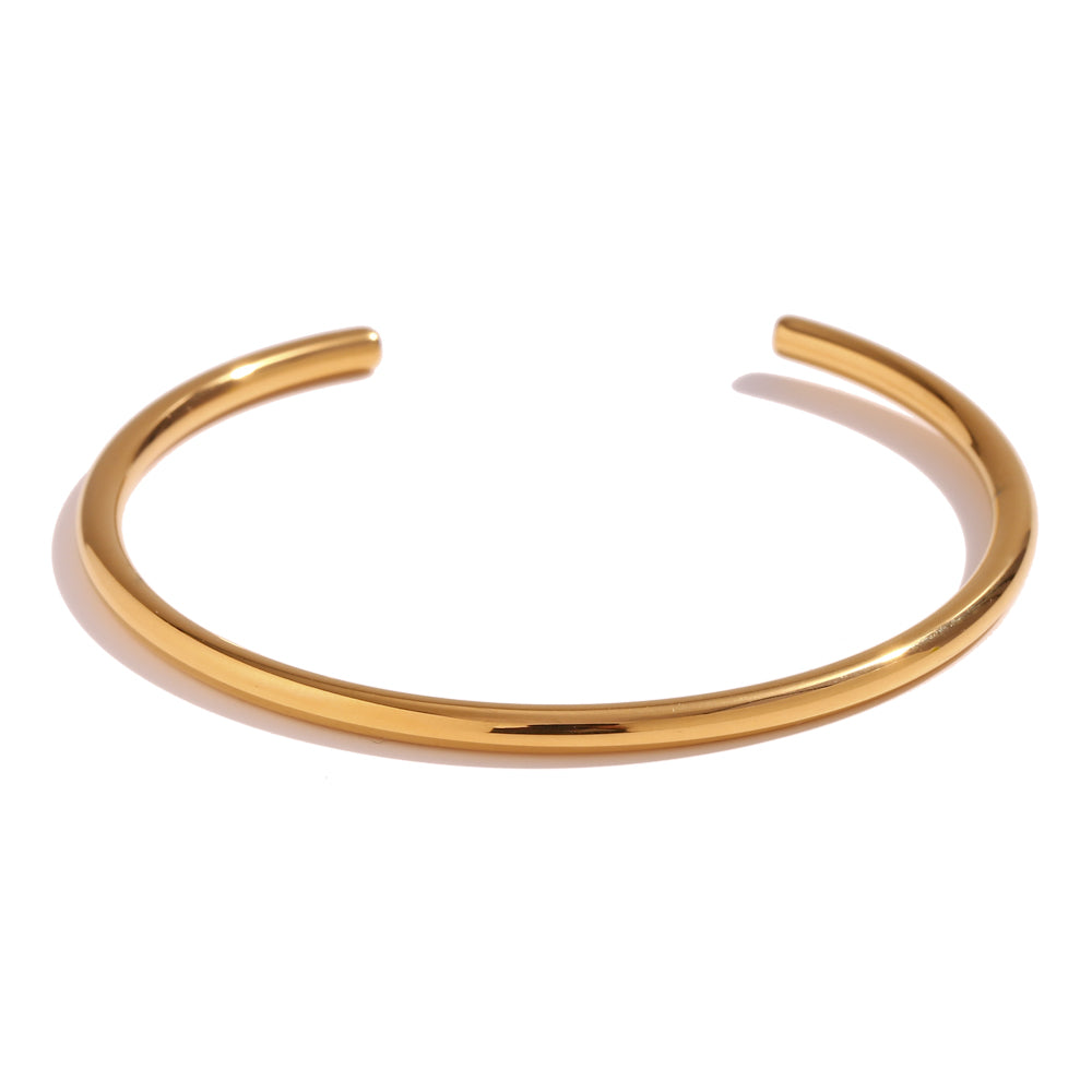 Pulsera Rígida Abierta · Acero bañado en oro